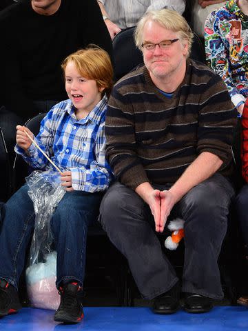 <p>James Devaney/WireImage</p> Philip Seymour Hoffman and his son Cooper Hoffman at the Detroit Pistons vs New York Knicks game at Madison Square Garden on November 25, 2012 in New York City