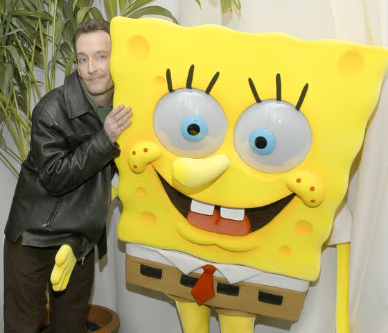 Jamie McCarthy/WireImage Tom Kenny poses with a SpongeBob statue during a New York City screening of 'The SpongeBob SquarePants Movie'