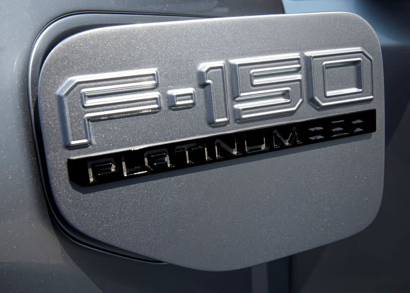 FILE PHOTO: The charging port cover is seen on the Ford F-150 Lightning pickup truck during a press event in New York