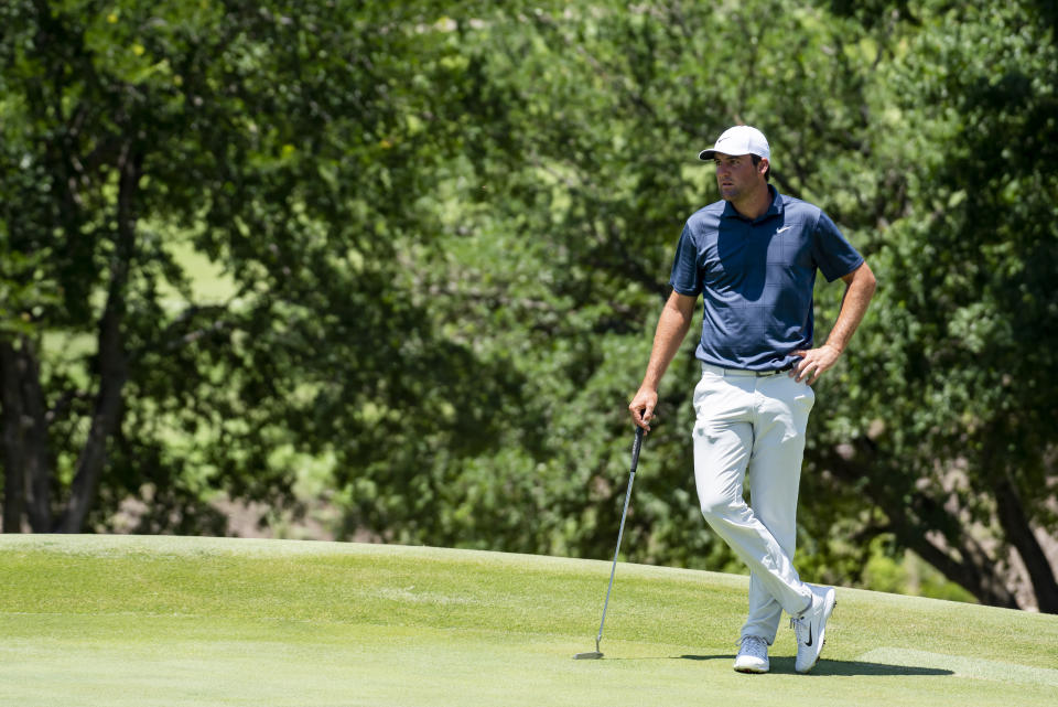 Scottie Scheffler waits to putt on the first hole during the first round of the AT&T Byron Nelson golf tournament in McKinney, Texas, on Thursday, May 12, 2022. (AP Photo/Emil Lippe)