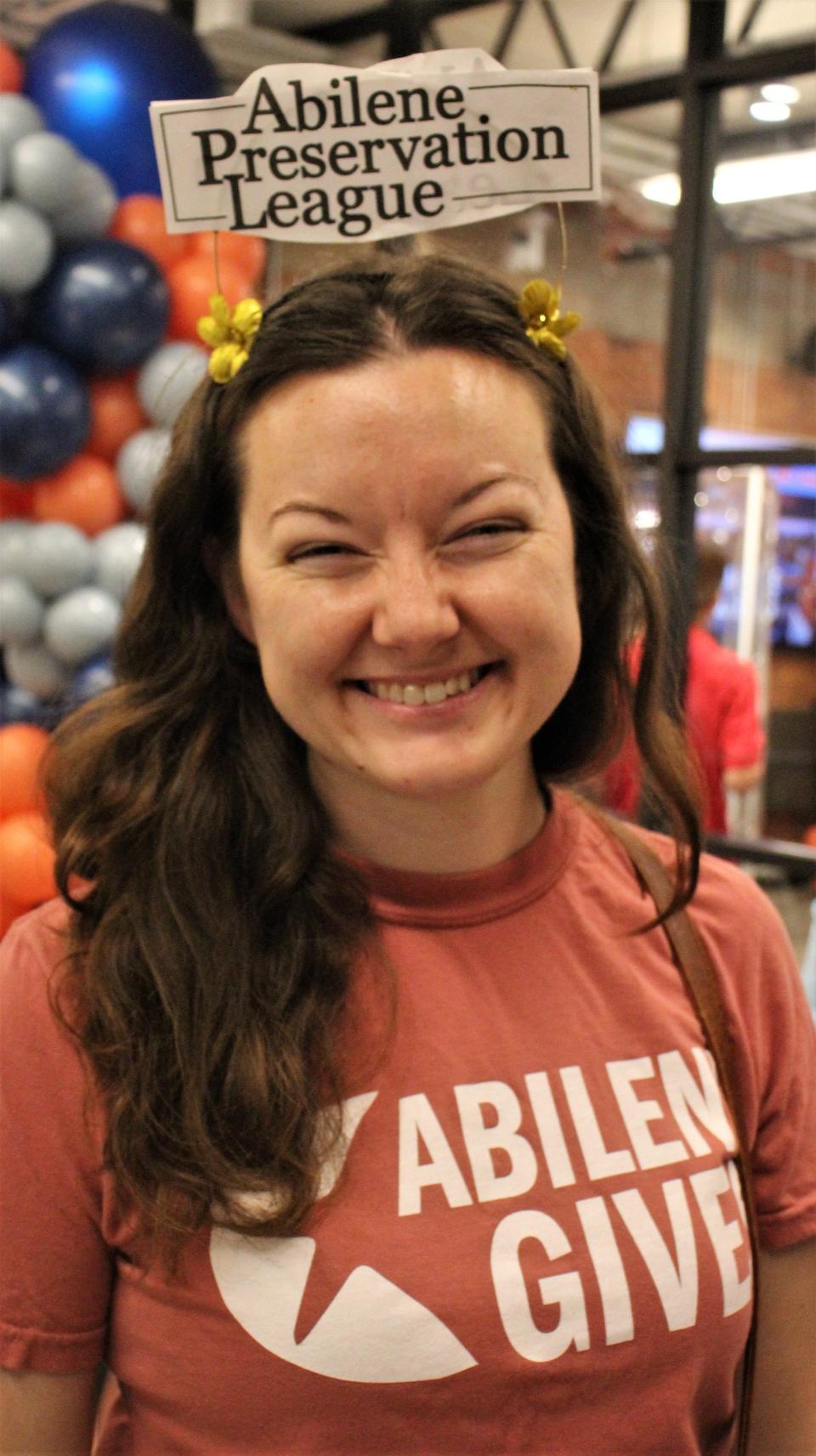 Morgan Paschal, development director, promotes Abilene Preservation League at Tuesday's Abilene Gives kickoff breakfast. The organization held a historic cemetery tour three days before.