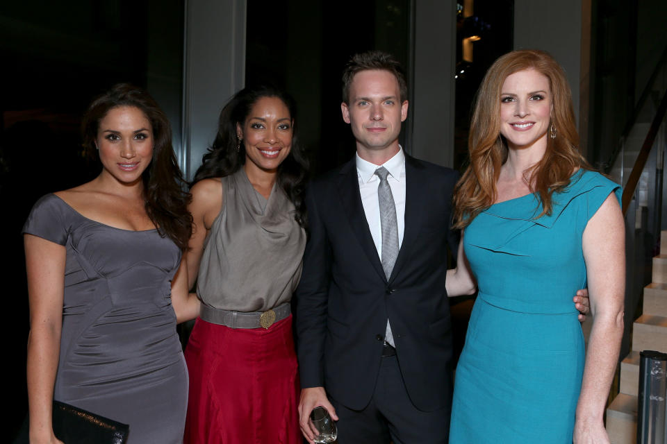 Meghan with her Suits co-stars in Toronto, in 2012 [Photo: Getty]