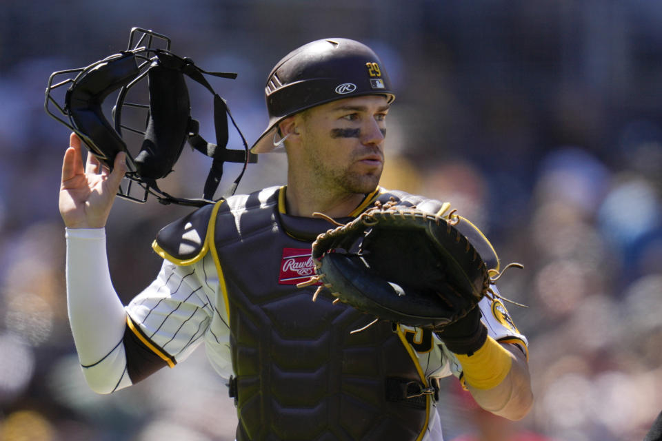 San Diego Padres catcher Brett Sullivan walks back towards home plate after a visit on the mound with starting pitcher Seth Lugo during the fifth inning of a baseball game against the Cincinnati Reds, Wednesday, May 3, 2023, in San Diego. (AP Photo/Gregory Bull)