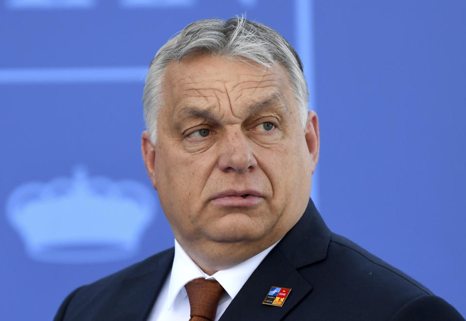 FILE - Hungary President Viktor Orban arrives at the NATO Heads of State summit in Madrid, June 30, 2022. Hungary's controversial prime minister is coming to the United States to address a gathering of conservative activists. Orban has become a hero to many on the right for his push against immigration, LGBTQ rights and progressives. (Bertrand Guay, Pool via AP, File)