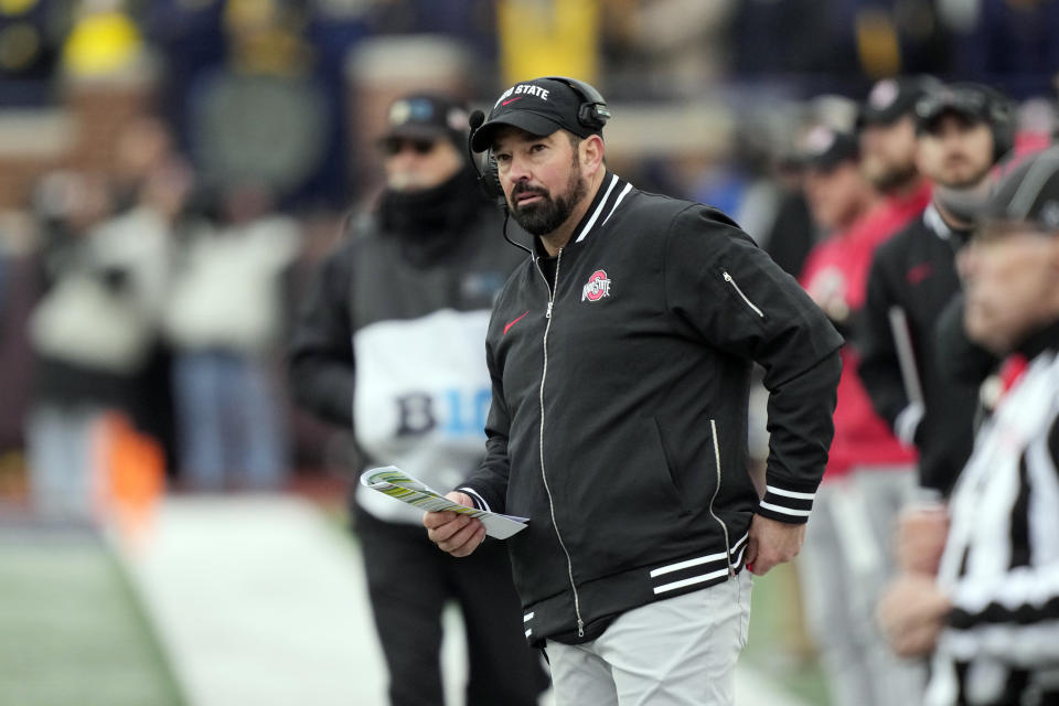 Ohio State head coach Ryan Day watches from the sideline during the second half of an NCAA college football game against Michigan, Saturday, Nov. 25, 2023, in Ann Arbor, Mich. (AP Photo/Carlos Osorio)