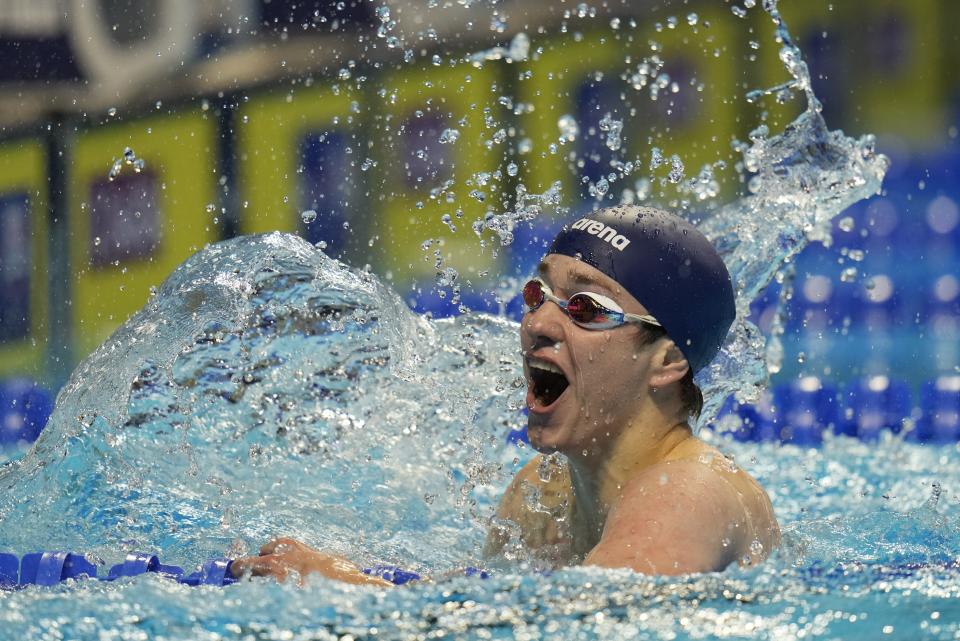 Jake Mitchell reacts after his lone men's 400 freestyle qualifying heat during wave 2 of the U.S. Olympic Swim Trials on Tuesday, June 15, 2021, in Omaha, Neb. (AP Photo/Jeff Roberson)