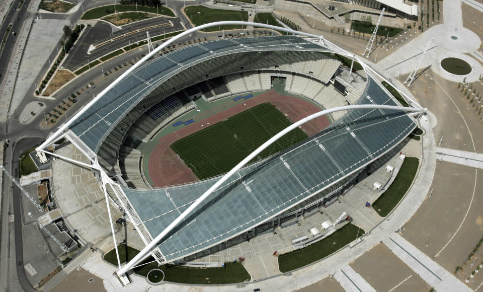 FILE - The Olympic stadium is seen from above in Athens, Greece on April 19, 2006. Government officials say Monday, Oct. 2, 2023 a new inspection has been ordered at a stadium that hosted the Athens Olympics in 2004 after rust was found along the iconic arched roof, forcing the site to close. The arched roof structures were designed by renowned Spanish architect Santiago Calatrava for the 2004 Athens Olympics. (AP Photo/Thanassis Stavrakis, File)