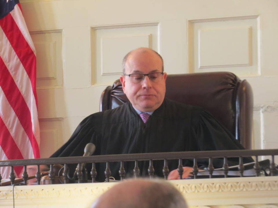 Assignment Judge Stuart Minkowitz presides over a hearing challenging the results of a close November Mendham Township Committee election in the Historic Courtroom at Morristown Superior Court,