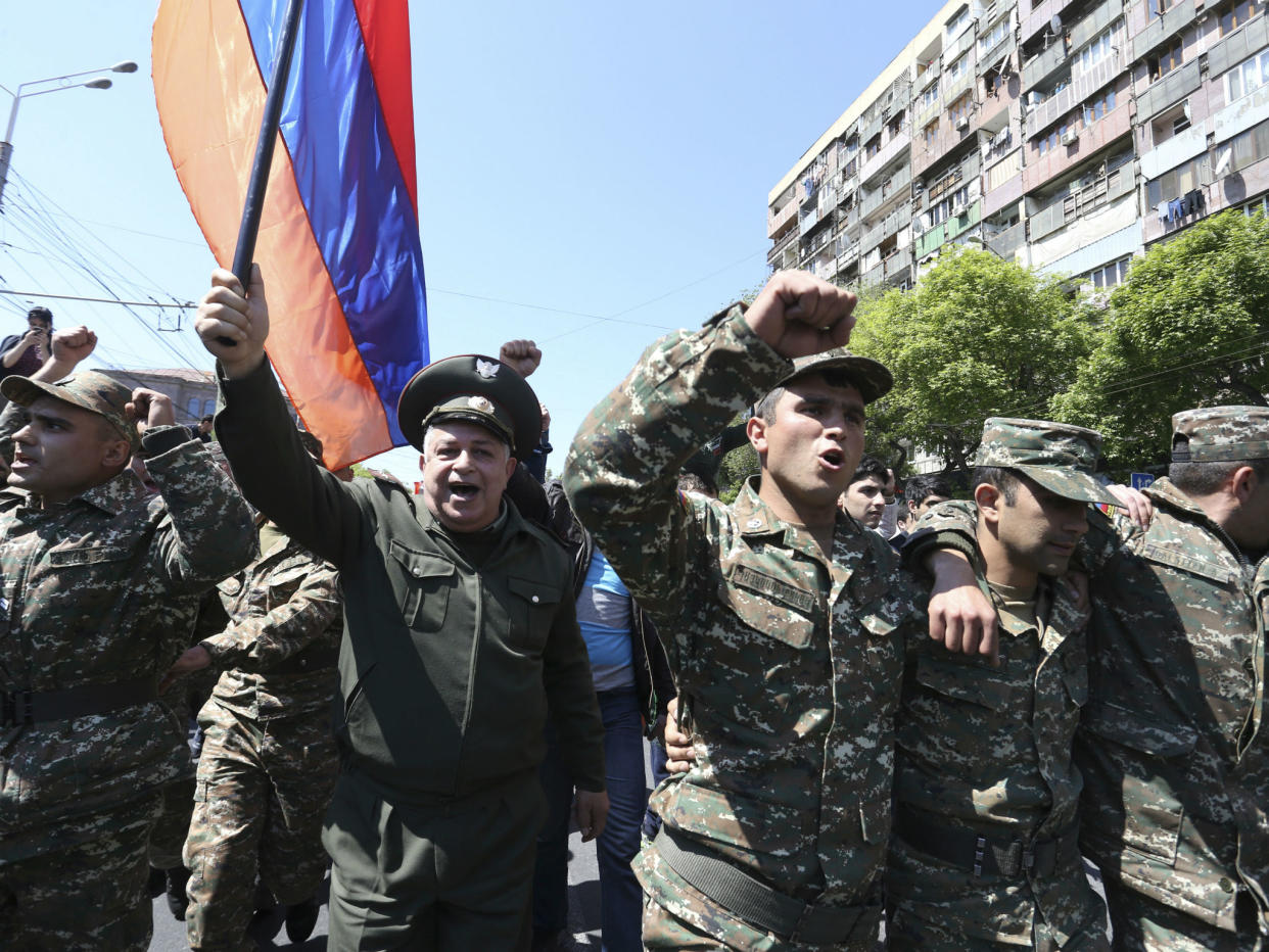 People march during a protest against the appointment of ex-president Serzh Sarksyan as the new prime minister in Yerevan: Reuters