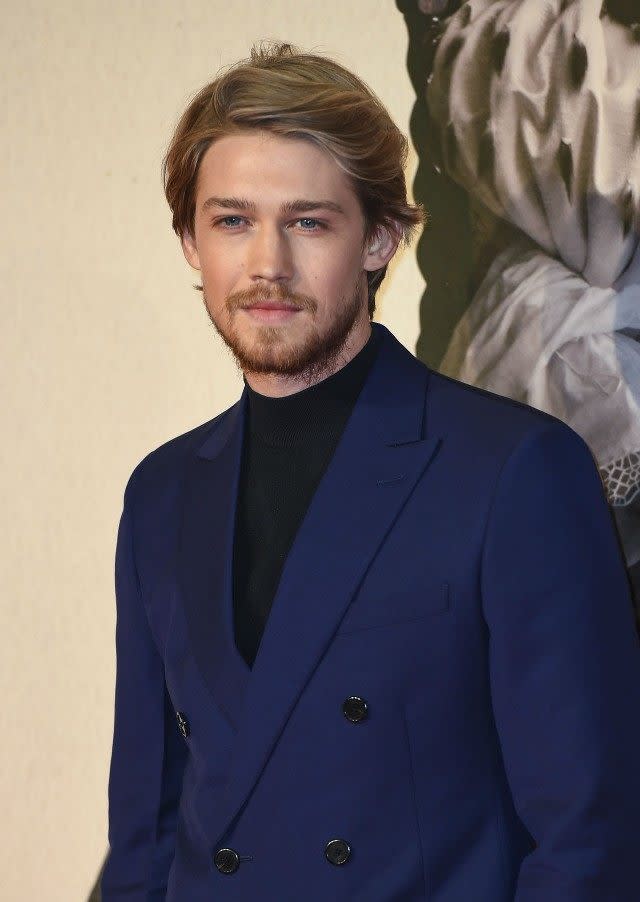 The British actor was also sporting some scruffy new facial hair on the red carpet.