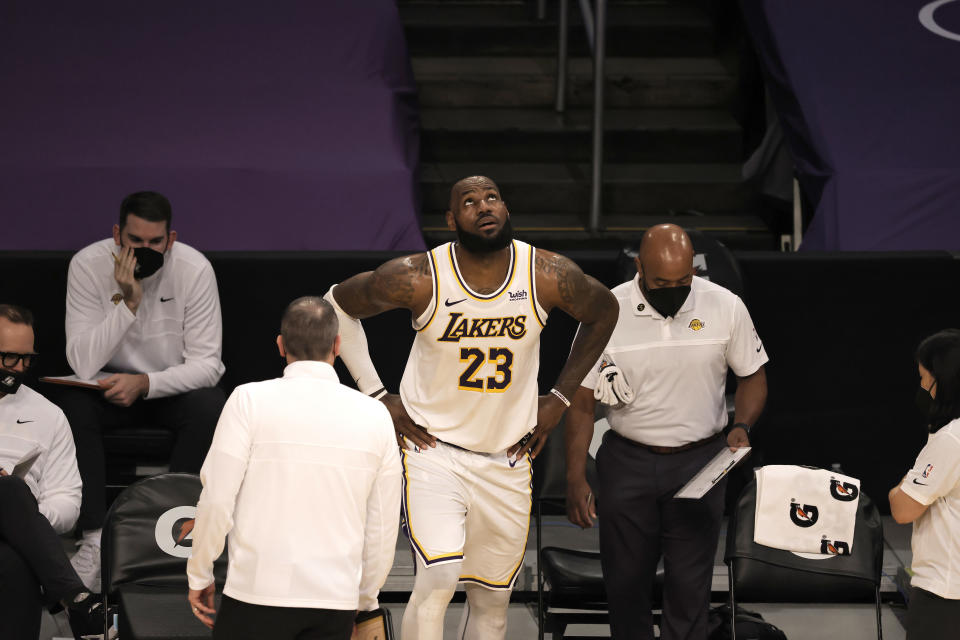  LeBron James #23 of the Los Angeles Lakers reacts to an apparent injury during the second period of a game against the Atlanta Hawks at Staples Center on March 20, 2021 in Los Angeles, California. NOTE TO USER: User expressly acknowledges and agrees that, by downloading and or using this photograph, User is consenting to the terms and conditions of the Getty Images License Agreement. (Photo by Michael Owens/Getty Images)