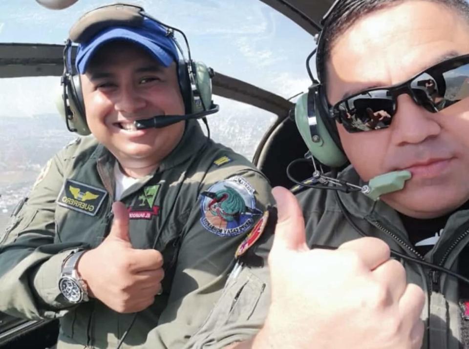 <div class="inline-image__caption"><p>"Guillén, right, on a training flight with another pilot near the Ilopango Air Base for the 1st air brigade in El Salvador. Before his assignment in Mali, he had been a UN peacekeeper in the Ivory Coast."</p></div> <div class="inline-image__credit">PHOTO COURTESY OF THE GUILLÉN FAMILY</div>