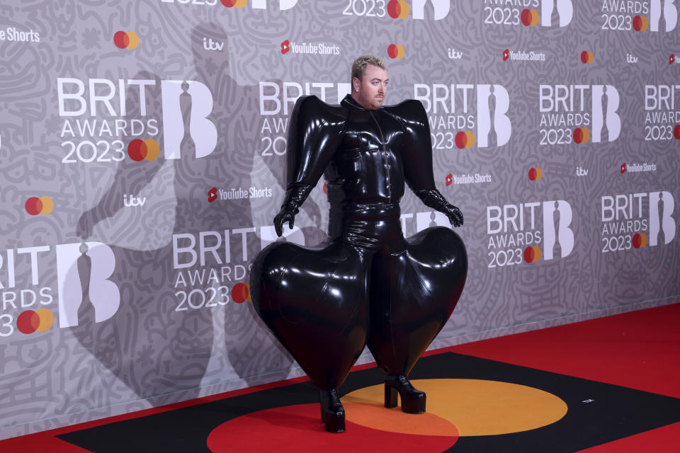 Sam Smith poses for photographers upon arrival at the Brit Awards 2023 in London, Saturday, Feb. 11, 2023. (Photo by Vianney Le Caer/Invision/AP)