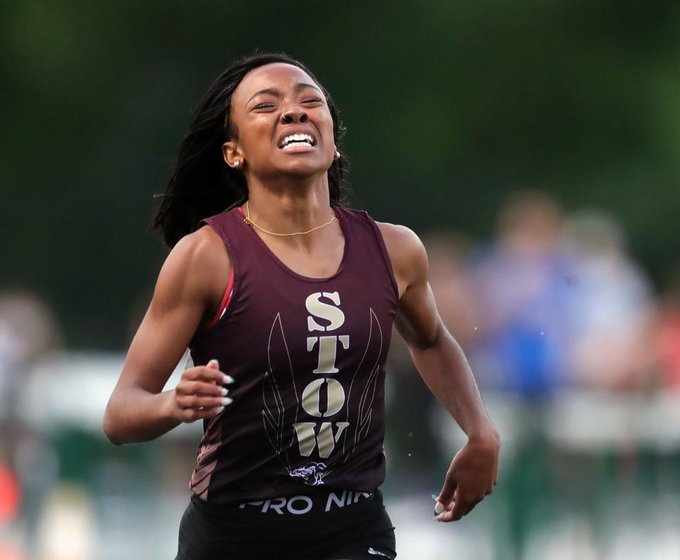 Jayla Atkinson of Stow crosses the finish line first in the girls 800 meter run during the Division I district track meet at Nordonia High School, Friday, May 17, 2024, in Macedonia, Ohio.