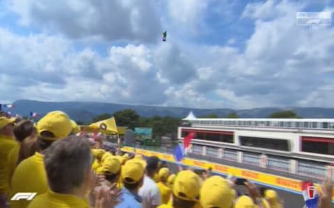 A man on a hoverboard above the track - Credit: SKY SPORTS F1