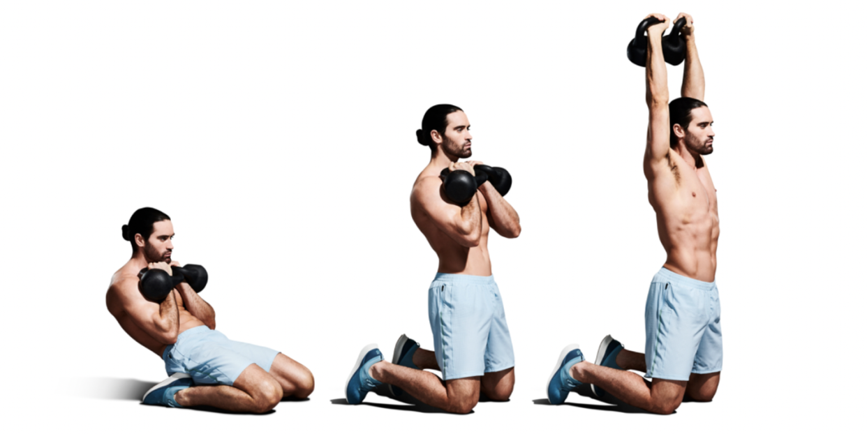 a group of men lifting weights