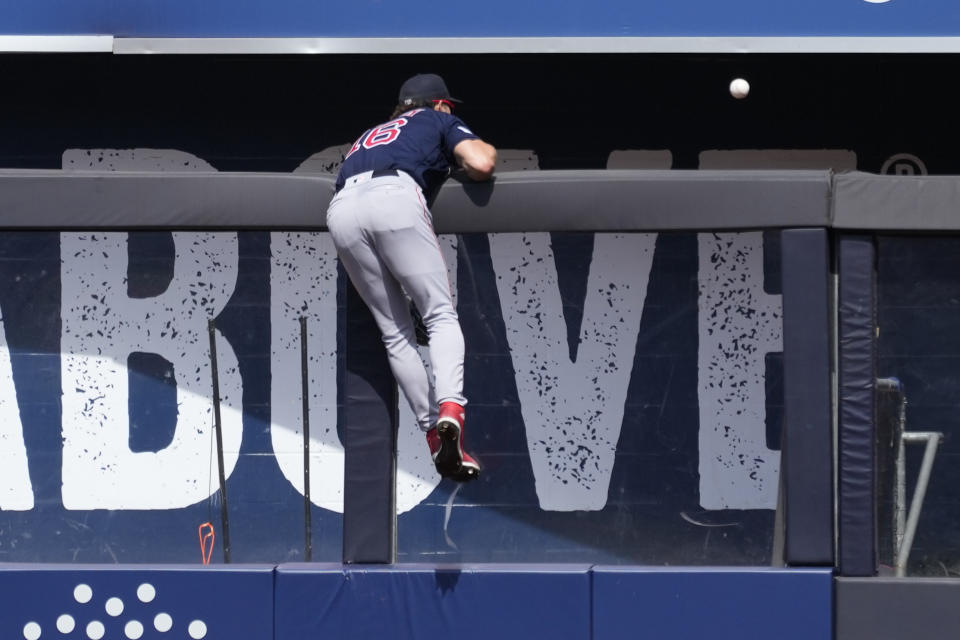 Boston Red Sox center fielder Jarren Duran watches as a solo home run hit by New York Yankees' Aaron Judge goes over the wall in the sixth inning of a baseball game, Saturday, Aug. 19, 2023, in New York. The hit broke up a no-hitter for Red Sox pitcher Kutter Crawford. (AP Photo/Mary Altaffer)