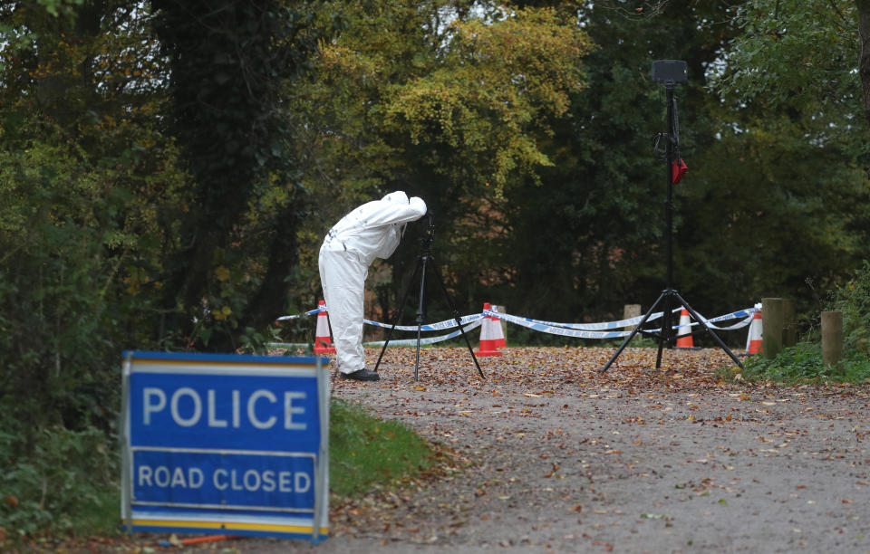 Forensic investigators at Watlington Hill in Oxfordshire after the body of a woman was discovered at the National Trust estate, a man has been arrested on suspicion of murder and is being treated for serious injuries, police said.