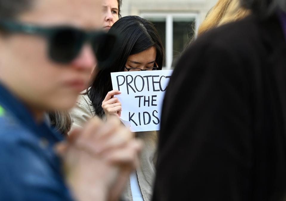 Demonstrators protest against gun violence in front of the Cordell Hull legislative office building on Tuesday, March 28, 2023, in Nashville, Tenn., after mass shooting Monday at The Covenant School.