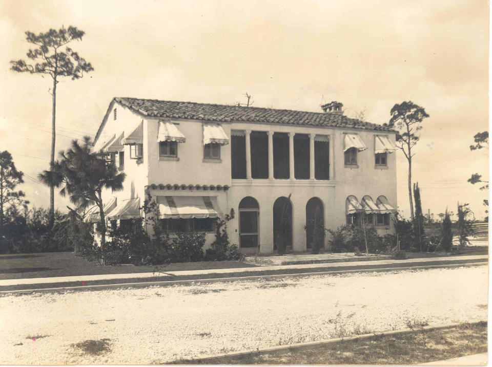 This image of the Karl Riddle House was taken in the 1920s. The house was moved from the Hillcrest neighborhood east of Palm Beach International Airport to downtown West Palm Beach when the neighborhood was bought out by the county because airplane noise made it unsuitable for residents.