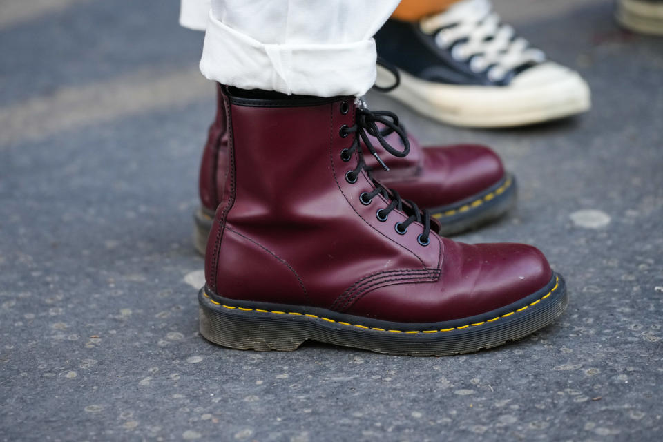 Dr Martens, known for its chunky leather boots with yellow stitching, said sales rose 11% to £397m ($412m) in the quarter to 31 December, a slowdown compared to the 16% first-half increase