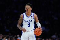 Duke's Paolo Banchero (5) looks to pass during the first half of an NCAA college basketball game against Kentucky Tuesday, Nov. 9, 2021, in New York. (AP Photo/Frank Franklin II)