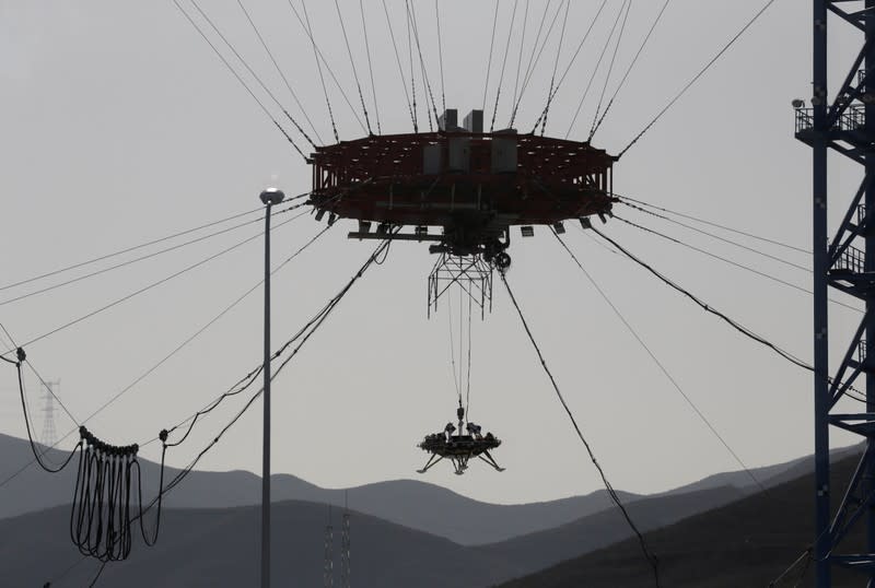 A lander for China's Mars mission is seen after a hovering-and-obstacle avoidance test at a test facility in Huailai