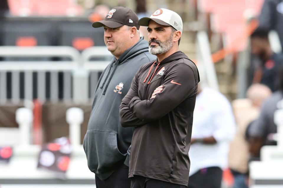 Browns coach Kevin Stefanski, right, and offensive coordinator Alex Van Pelt watch warm ups before a game against the Tennessee Titans on Dept. 24, 2023, in Cleveland.