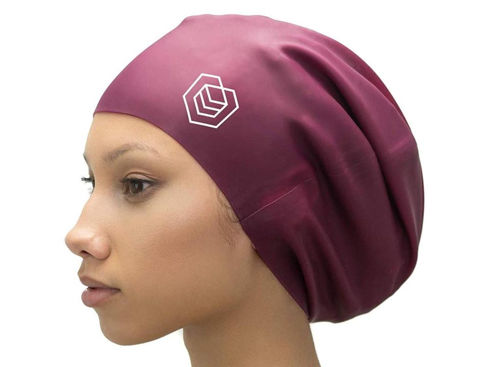 Keep afro hair tucked neatly away with this swim cap (Amazon)