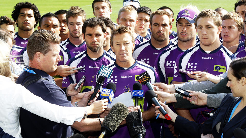 Craig Bellamy and the Melbourne Storm players, pictured here addressing the cheating scandal in 2010. 