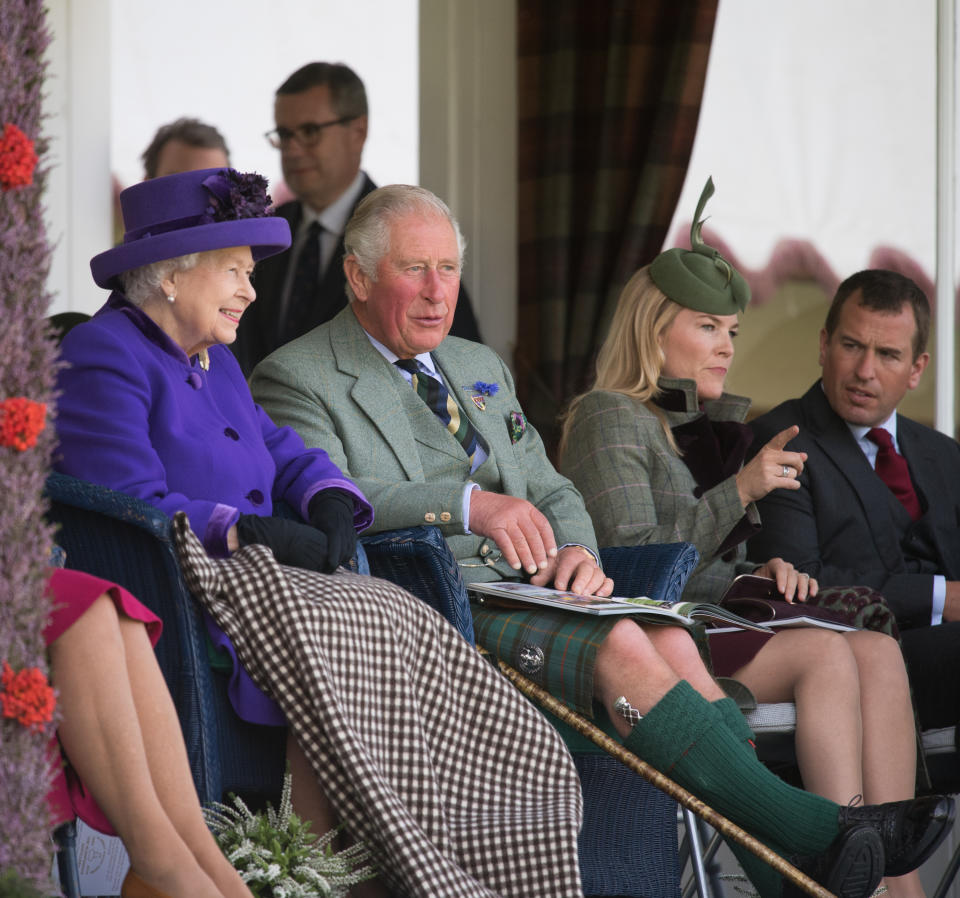 The Queen and Prince Charles were joined by Princess Anne's son and daughter-in-law Peter and Autumn Philips at the Highland Games in Braemar, Scotland. Photo: Getty Images 