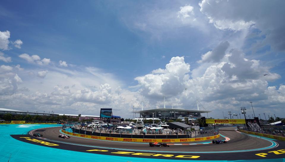 May 6, 2022; Miami Gardens, Florida, USA; Formula 1 drivers race into turn 8 the MIA Marina through the circuit during the third practice session for the Miami Grand Prix at Miami International Autodrome. Mandatory Credit: John David Mercer-USA TODAY Sports