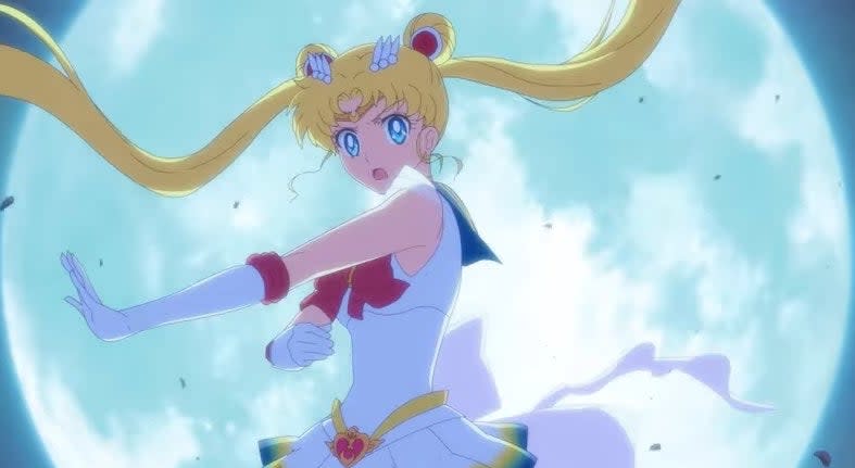 Sailor Moon posing with the full moon behind her in "Sailor Moon Eternal"