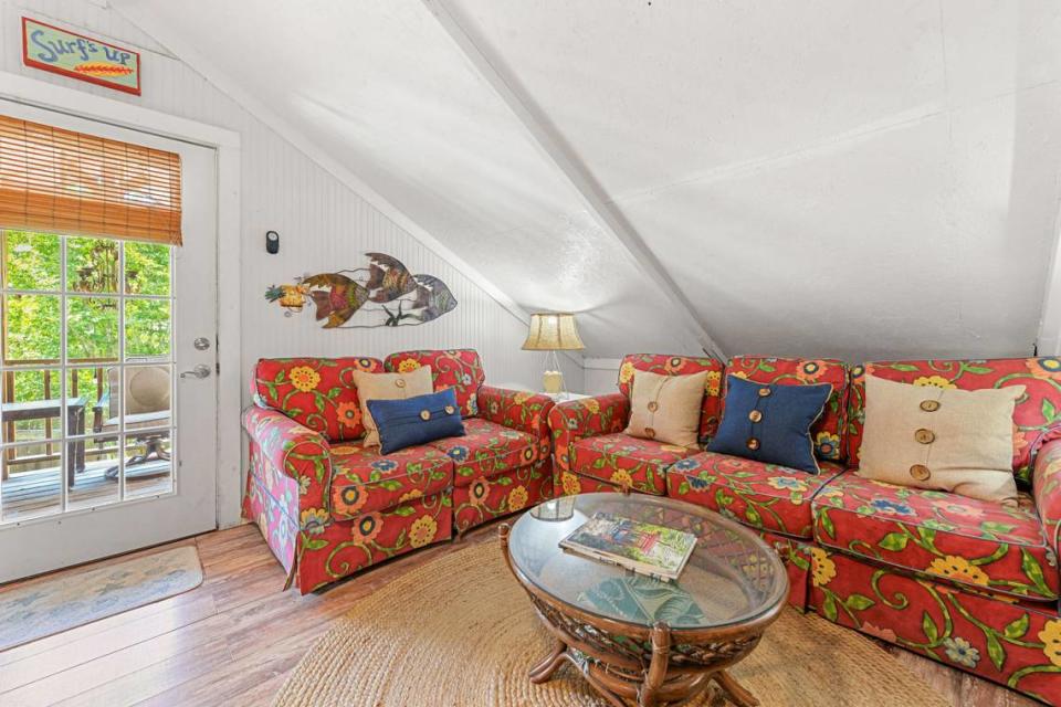 The living area in the upstairs apartment on the Breezy Porches property in Waveland. Two apartments are located in a building behind the main house. MS Real Estate Photography