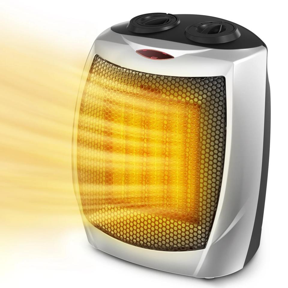 silver small space heater emitting heat