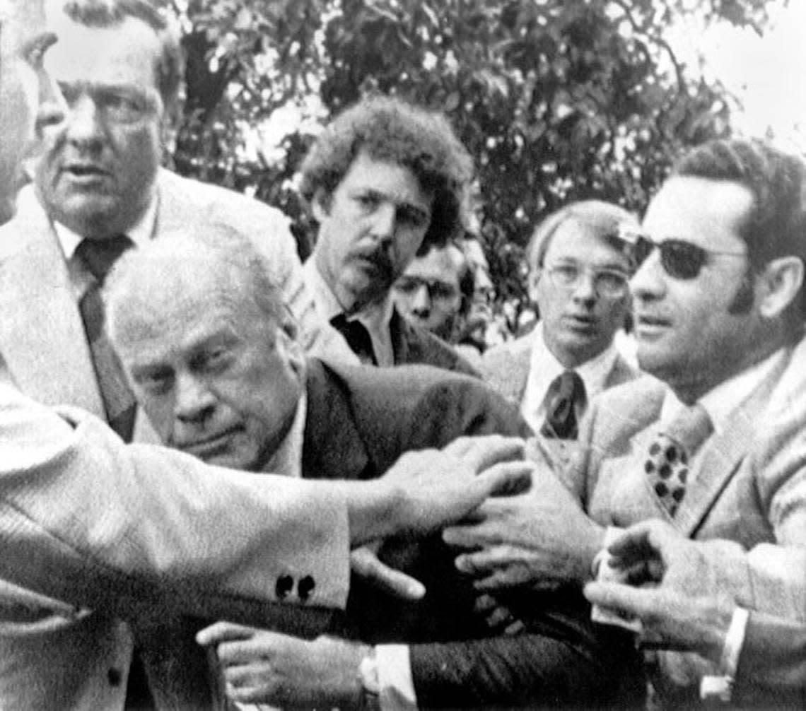 President Gerald Ford is shielded by the Secret Service after an assassination attempt by Lynette “Squeaky” Fromme on Sept. 15, 1975. President Ford had spoken at a “Host Breakfast,” and was walking to California’s state Capitol in Sacramento.