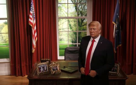 A waxwork of U.S. President-elect Donald Trump is displayed during a media event at Madame Tussauds in London, Britain January 18, 2017. REUTERS/Neil Hall