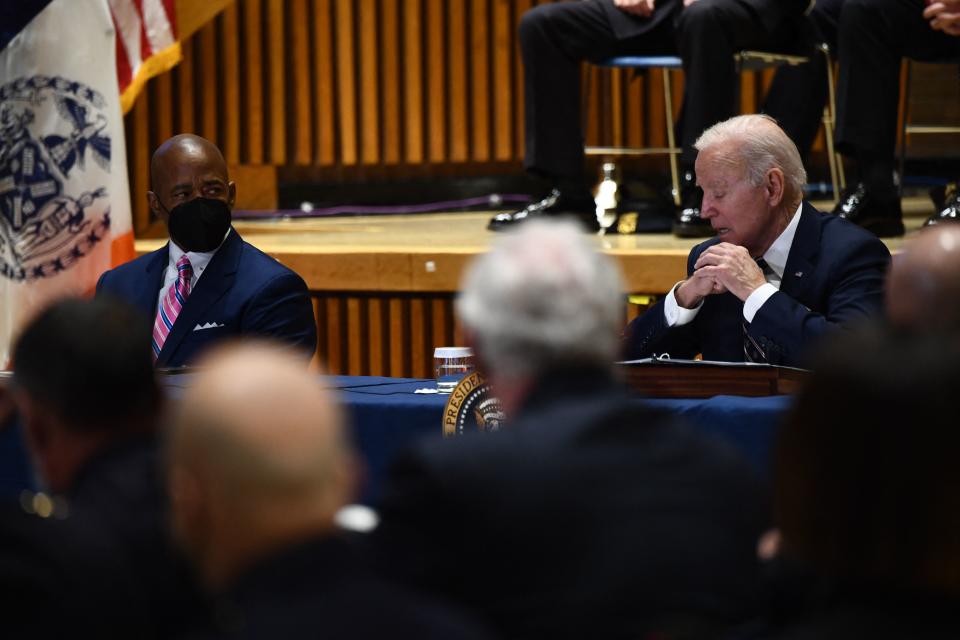 US President Joe Biden (R) and and New York City Mayor Eric Adams (L) participate in a Gun Violence Strategies Partnership meeting at the NYPD Headquarters in New York on February 3, 2022. (Brendan Smialowski/AFP via Getty Images)