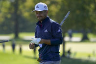 Xander Schauffele, of the United States, reacts on the second green during the third round of the US Open Golf Championship, Saturday, Sept. 19, 2020, in Mamaroneck, N.Y. (AP Photo/John Minchillo)