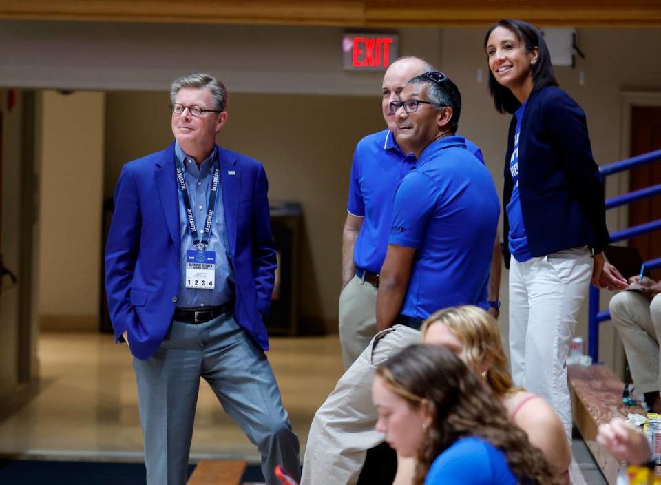 Duke President Vincent Price, left, and athletics director Nina King, right, watch warmups before Duke volleyball’s game against East Tennessee State University in the Duke Invitational at Cameron Indoor Stadium in Durham, N.C., Friday, Sept. 2, 2022.