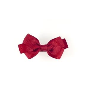 <p><em><a rel="nofollow noopener" href="https://amaiakids.co.uk/accessories/hair-accessories/medium-hair-bow-red" target="_blank" data-ylk="slk:Amaia;elm:context_link;itc:0;sec:content-canvas" class="link ">Amaia</a>, £4 ($5.50)</em> </p>