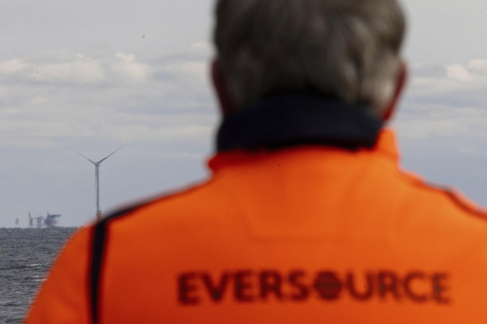 The first operating South Fork Wind farm turbine, Thursday, Dec. 7, 2023, 35 miles east of Montauk Point, N.Y. The turbine at the commercial-scale offshore wind farm is producing power for the U.S. electric grid for the first time. (AP Photo/Julia Nikhinson)