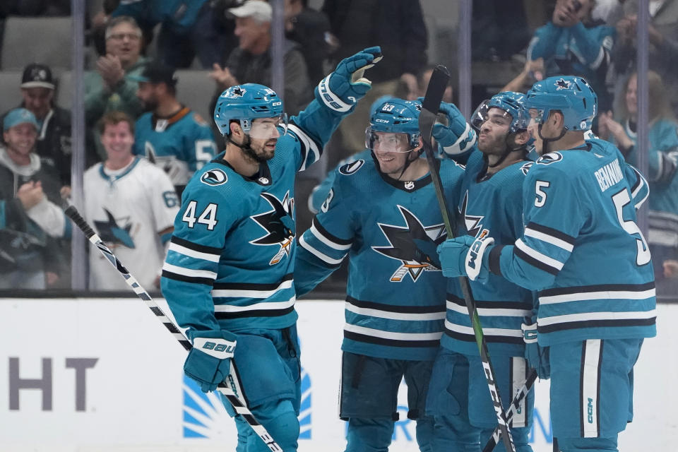 San Jose Sharks left wing Matt Nieto, second from left, celebrates with teammates after scoring against the Vegas Golden Knights during the second period of an NHL hockey game in San Jose, Calif., Tuesday, Oct. 25, 2022. (AP Photo/Godofredo A. Vásquez)