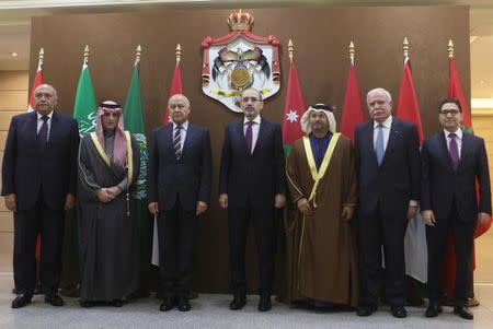 (L-R) Egyptian Foreign Minister Sameh Shoukry , Saudi Foreign Minister Adel al-Jubeir, Arab League Secretary-General Ahmed Aboul Gheit, Jordanian Foreign Minister Ayman Safadi, Minister of State for Foreign Affairs for the United Arab Emirates, Palestinian Foreign Minister Riyad Al Maliki and Morocco's Foreign Minister Nasser Bourita, pose before their meeting to discuss the U.S decision to recognise Jerusalem as Israel's capital, in Amman, Jordan January 6, 2018. Petra News Agency/Handout via REUTERS