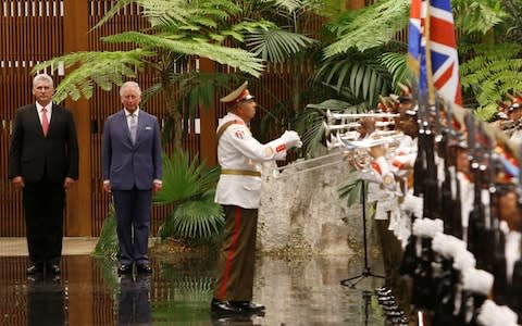 Cuba's President Miguel Diaz-Canel and Prince Charles attend a welcoming ceremony at the Revolution Palace in Havana - Credit: Reuters