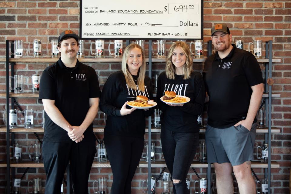 Flight Bar + Grille team from left to right: Brady Flattery (sous chef and assistant kitchen manager), Katie Boughey (executive chef and kitchen manager), Marianne Pacha (co-owner) and Matt Pacha (co-owner).