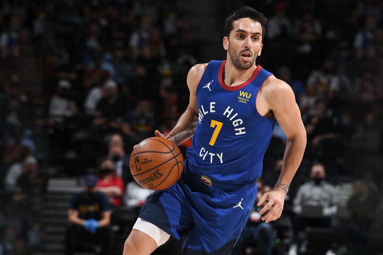 DENVER, CO - MAY 22: Facundo Campazzo #7 of the Denver Nuggets dribbles the ball during the game against the Portland Trail Blazers during Round 1, Game 1 of the the 2021 NBA Playoffs on May 22, 2021 at the Ball Arena in Denver, Colorado. NOTE TO USER: User expressly acknowledges and agrees that, by downloading and/or using this Photograph, user is consenting to the terms and conditions of the Getty Images License Agreement. Mandatory Copyright Notice: Copyright 2021 NBAE   Garrett Ellwood/NBAE via Getty Images/AFP (Photo by Garrett Ellwood / NBAE / Getty Images / Getty Images via AFP)