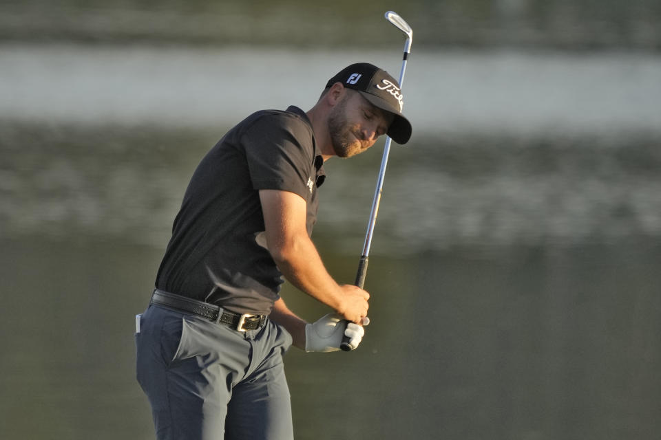 Wyndham Clark reacts to his shot on the 18th fairway during the first round of The Players Championship golf tournament Thursday, March 14, 2024, in Ponte Vedra Beach, Fla. (AP Photo/Lynne Sladky)