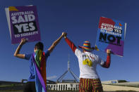 Same-sex marriage campaigners pose for pictures during an equality rally outside Parliament House in Canberra December 7, 2017. AAP/Lukas Coch/via REUTERS