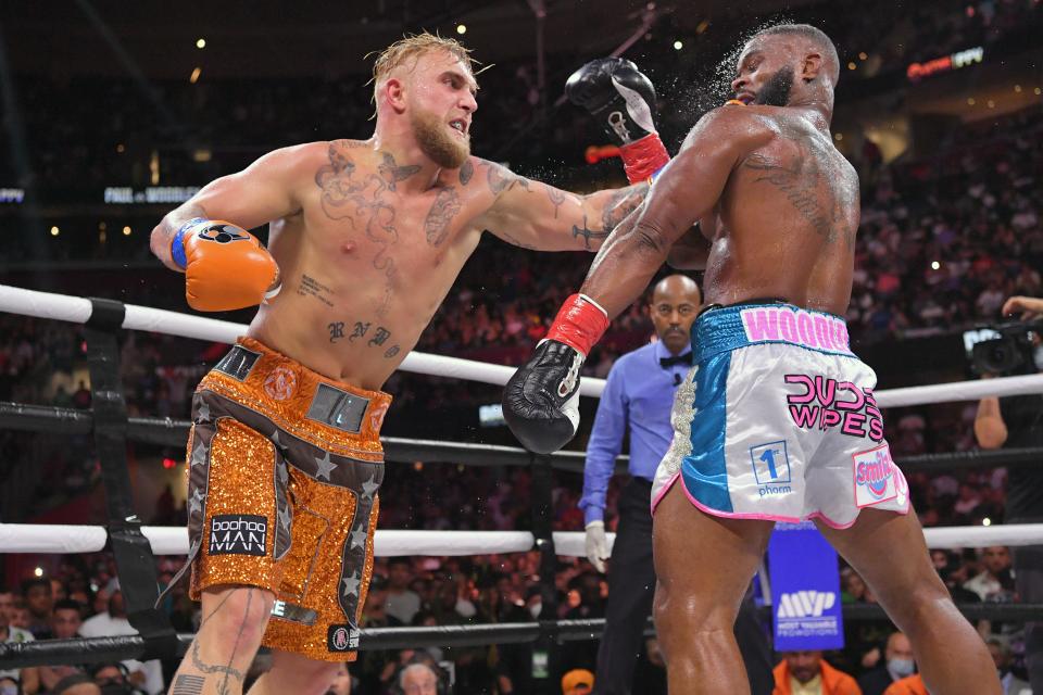 Jake Paul fights Tyron Woodley in their cruiserweight bout during a Showtime pay-per-view event at Rocket Mortgage Fieldhouse in Cleveland.